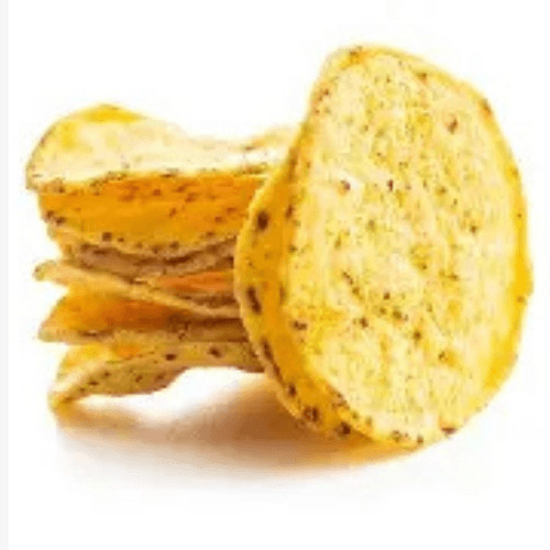 Slices of herb garlic bread stacked on a white background, toasted to a golden brown, with visible herbs.