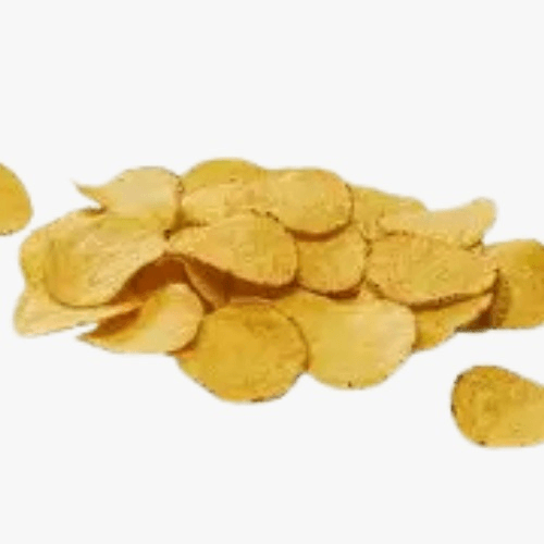 Pile of golden potato chips scattered on a white background/ surface.