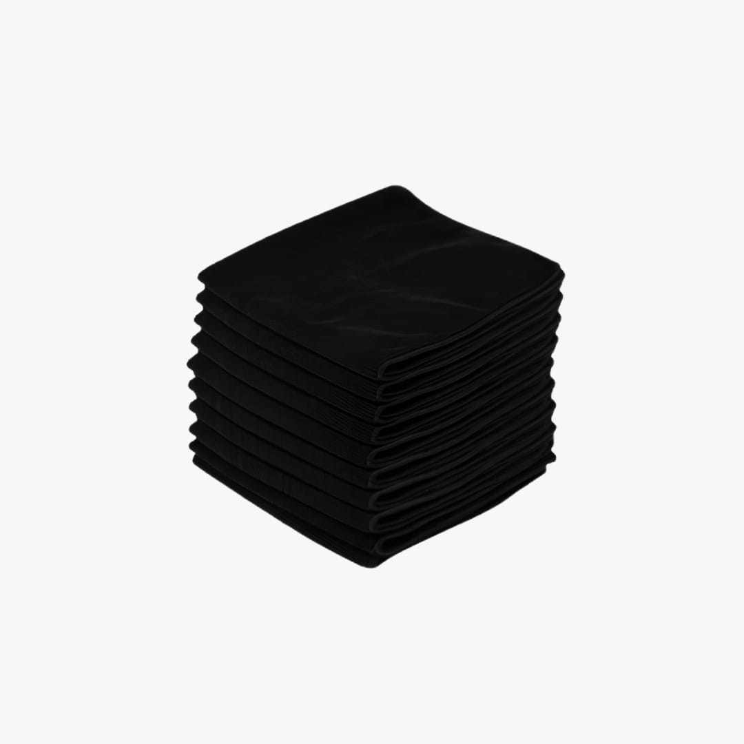 Stack of folded black napkins ready for use in dining settings